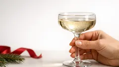 Glitter French tip nails are the minimal holiday manicure that still shines