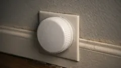 The bottle cap outlet cover trick: a quick way to hide dust on unused plugs